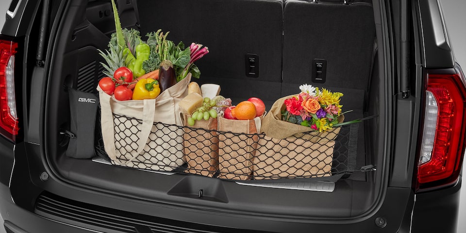 Red de carga vertical con bolsa de almacenamiento y logo GMC para la cajuela de tu Yukon 2025