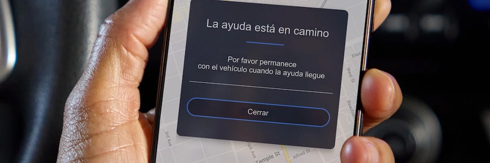 App OnStar Guardian para GMC con asistencia en emergencias y funciones de seguridad para compartir con familiares.