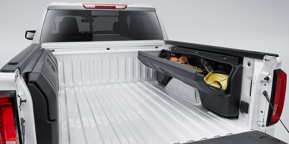 Compartimentos de almacenaje lateral, pickup GMC Sierra Denali